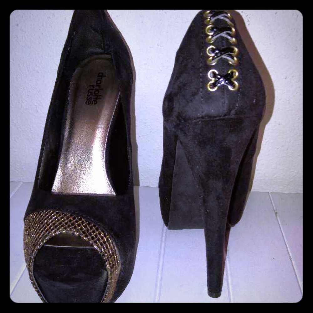 Black and gold pumps